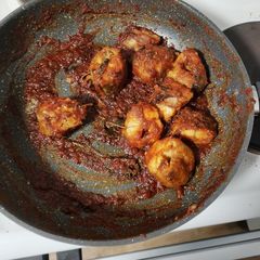 A picture of Pad Ped Pla Duk (Stir fried catfish with curry paste).