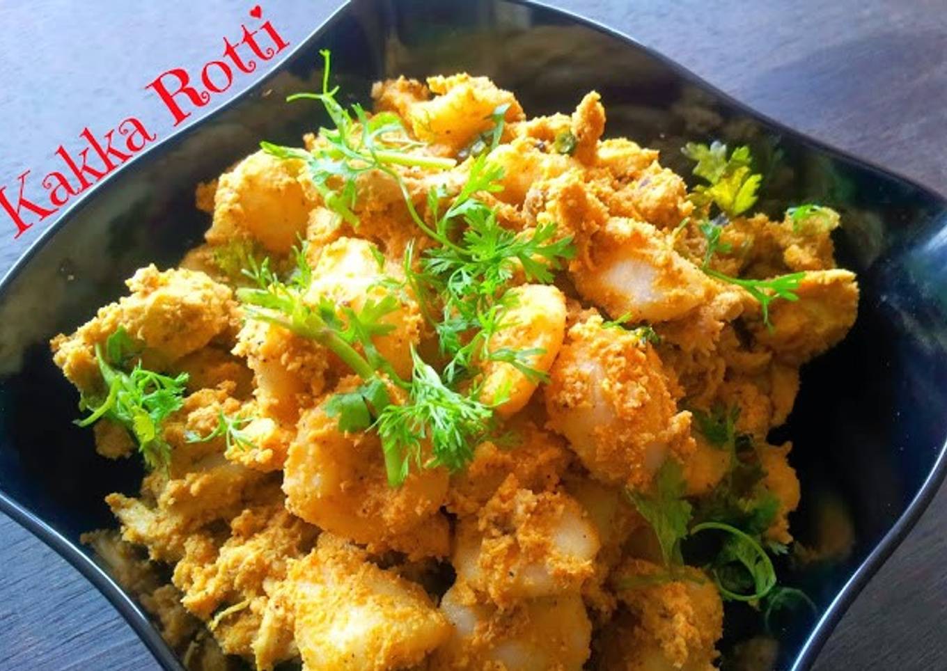 Kakkarotti - Steamed Rice Dumplings in Spicy Chicken Sauce
