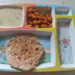 A picture of Puran poli / vedmi.