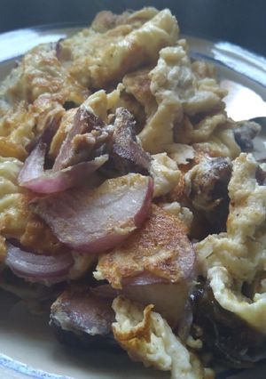 A picture of Fried eggs and leftover suya.