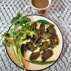 A picture of Coriander leaves pakora (Tea time snacks).