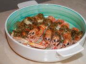 Una foto di frutti di mare gratinati
