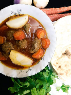 A picture of Shab Daig with Tandoori Roti (meetball with turnip & carrot in curry).