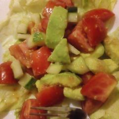 A picture of Cucumber,tomato,avocado salad.