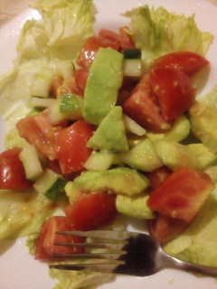 A picture of Cucumber,tomato,avocado salad.