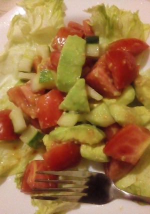 A picture of Cucumber,tomato,avocado salad.