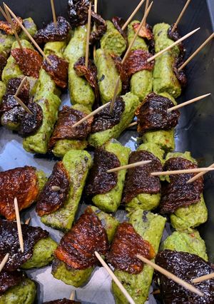 A picture of Vegan “pigs in blankets”.