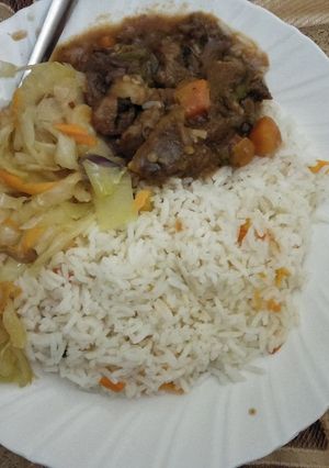 A picture of Rice cabbage with beef stew.