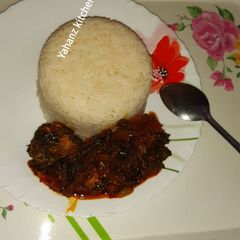 A picture of Vegetable soup with rice.