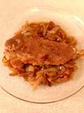 Presa ibérica marinada en vermouth con cebolla caramelizada