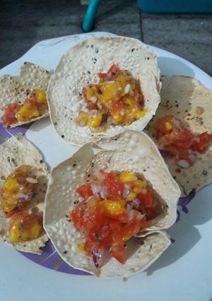 A picture of Mango salsa in papad basket #summer flavours #savoury.