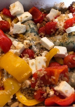 A picture of Feta, pine nut, roasted veg and bulgur wheat tray bake! (+ bonus sausages!).