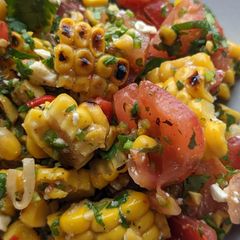A picture of Brighten-up-your-day Mexican corn + tomato salad.