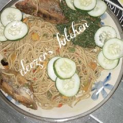 A picture of Spaghetti and vegetable sauce.