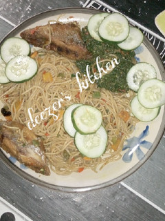 A picture of Spaghetti and vegetable sauce.
