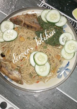 A picture of Spaghetti and vegetable sauce.