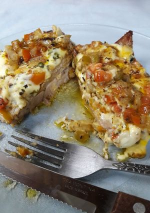Una foto de Vacío de cerdo a la pizza