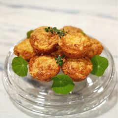 A picture of Cheddar, bacon and zucchini muffins.