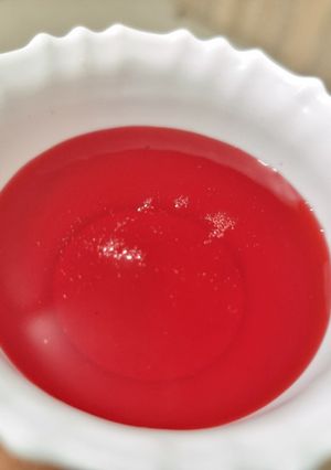 A picture of Rose syrup / Rasna shorbet syrup.