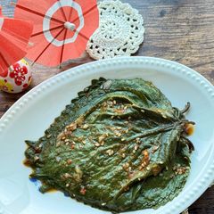 Tasty Perilla leaves with cooked rice A picture of Tasty Perilla leaves with cooked rice.