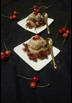 A picture of Cherry Icecream With Cherry Sauce.