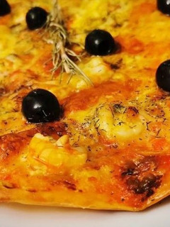 Una foto de Pizza de Gamba blanca de Huelva