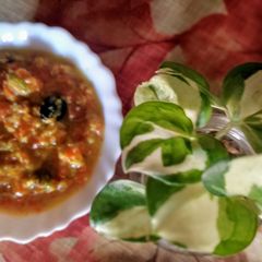 A picture of Gajar ka halwa with dry fruits overload.
