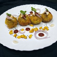 A picture of Leftover Rice bath paddu/bonds.