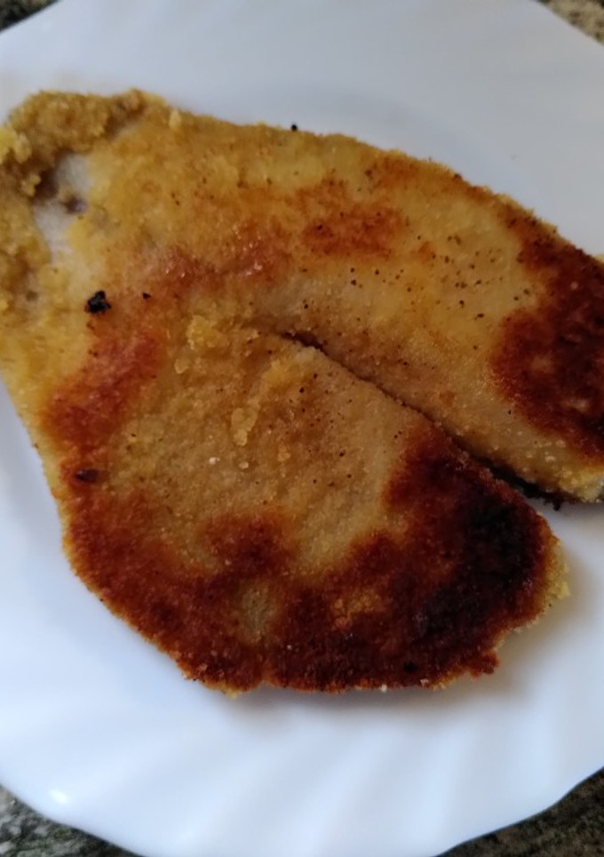 Una foto de Tilapia congelada con empanado simple