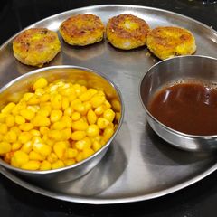 Corn Tikki Corn Masala with chutney A picture of Corn Tikki Corn Masala with chutney.
