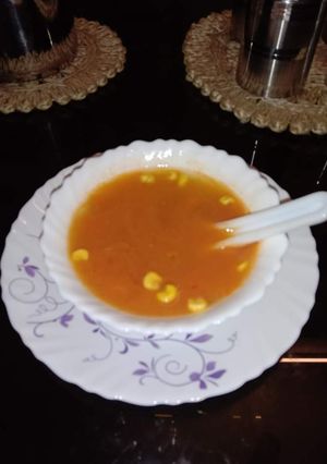 A picture of Carrot, corn soup.