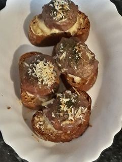 Una foto de Mini rosbif relleno de queso, aceite de oliva y finas hierbas