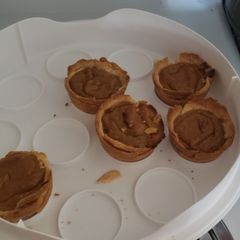 A picture of Mini pumpkin pies.