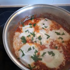 A picture of Shakshuka w feta.