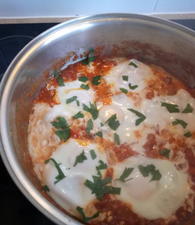 A picture of Shakshuka w feta.