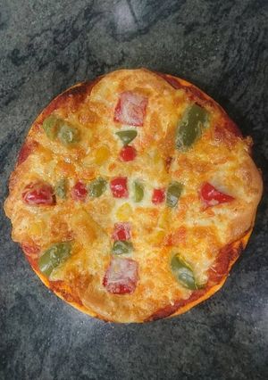 Una foto de Pizza de pimientos y mozzarella