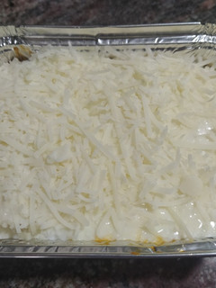 Una foto de Canelones de carne de cerdo con bechamel