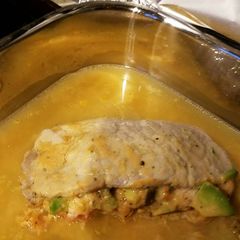 A picture of Avocado stuffed pork chops.