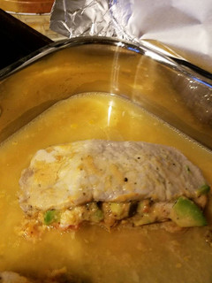 A picture of Avocado stuffed pork chops.