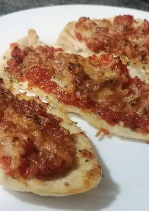 Una foto de Filete de pollo estilo pizza