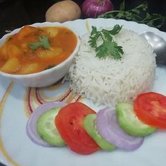 Rasedaar Aaloo with rice A picture of Rasedaar Aaloo with rice.