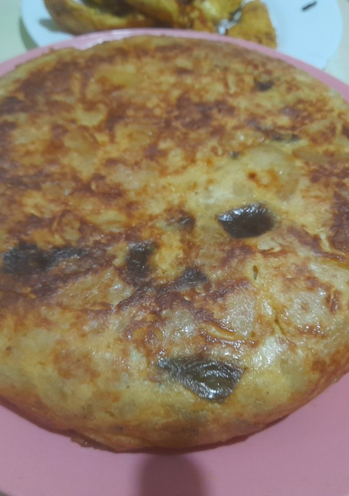 Una foto de Tortilla de calabacín y cebolla