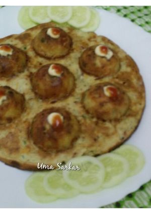 A picture of Cheese rawa appe omelette.