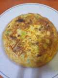 Tortilla con coles, feta y tomate seco
