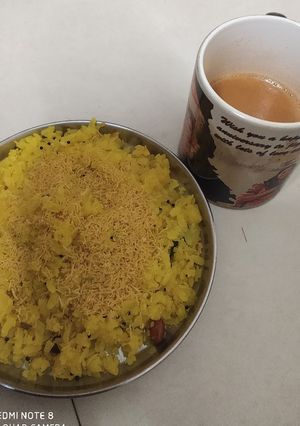 A picture of Poha with tea.