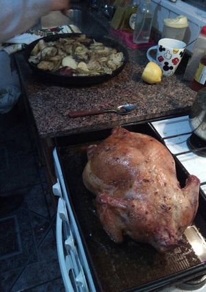 Una foto de Pollo al horno con verduras al casi chimi