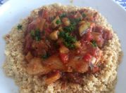Una foto de cous cous con berenjena