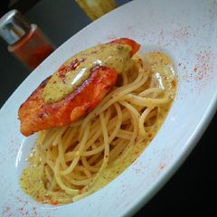A picture of Pan fried chicken with mustard yoghurt sauce.