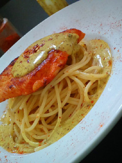 A picture of Pan fried chicken with mustard yoghurt sauce.