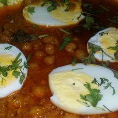 A picture of White chany with boiled egg.